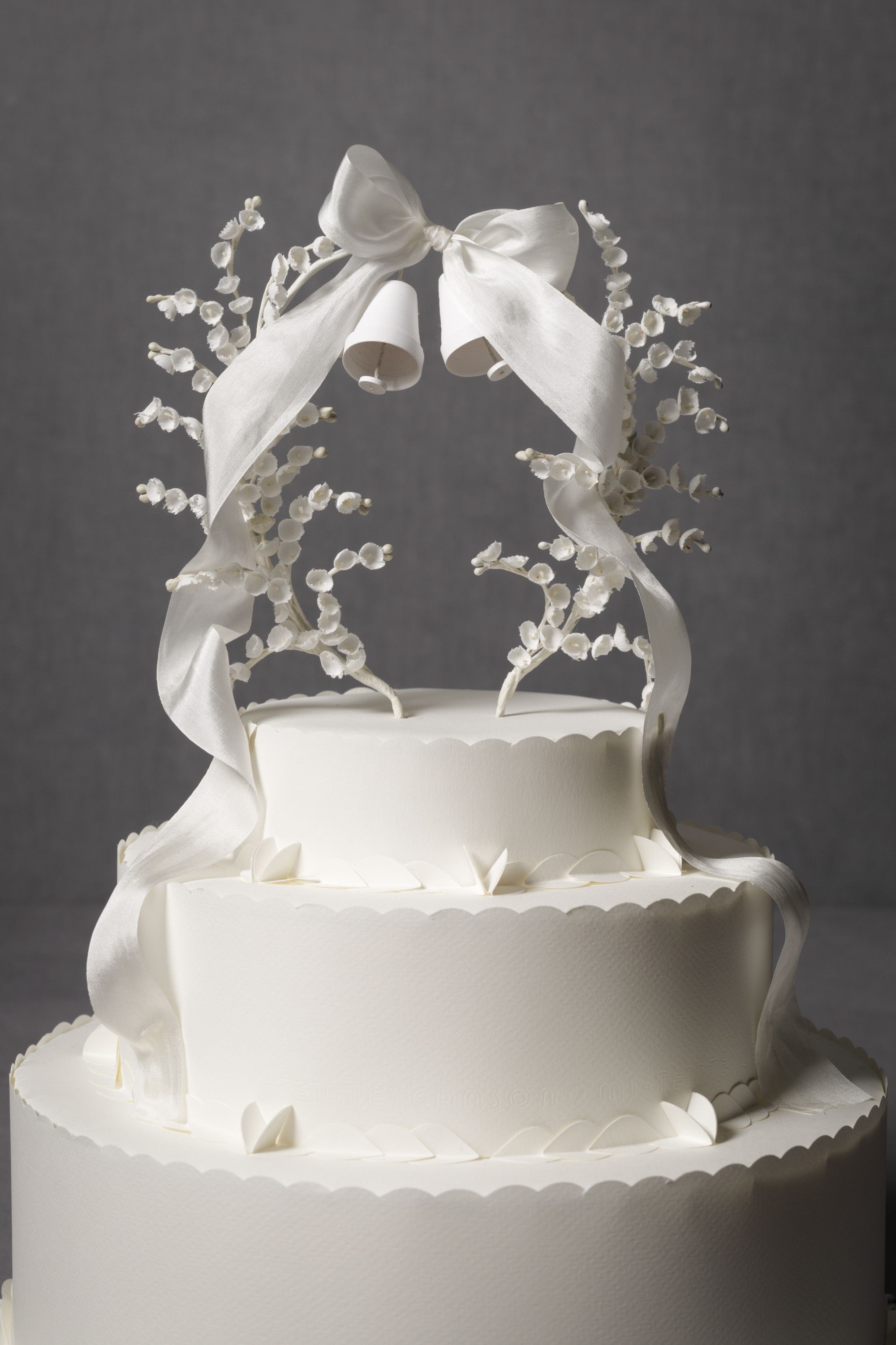 An extremely overpriced cake topper from BHLDN.