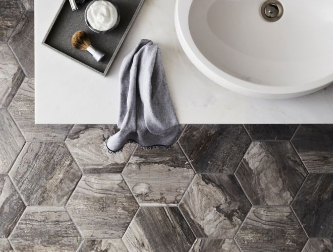 Rustic bathroom with wood look, hexagon floor tile.