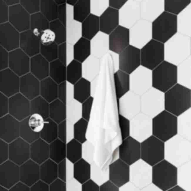 black and white hexagon tile in the shower.