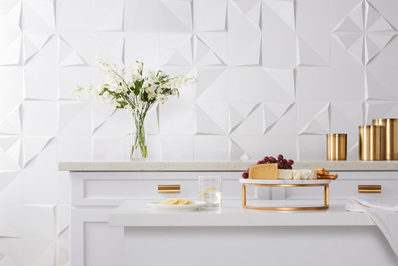 White 3-D contemporary wall tile on kitchen backsplash.