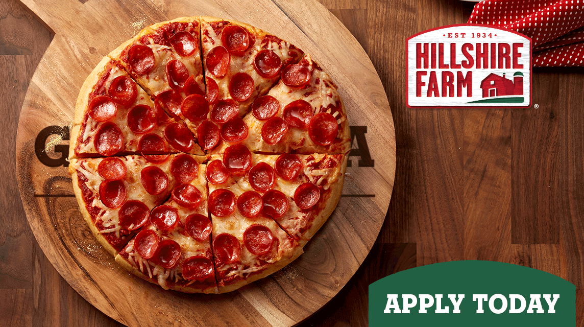 pizza toppings on a round pizza.