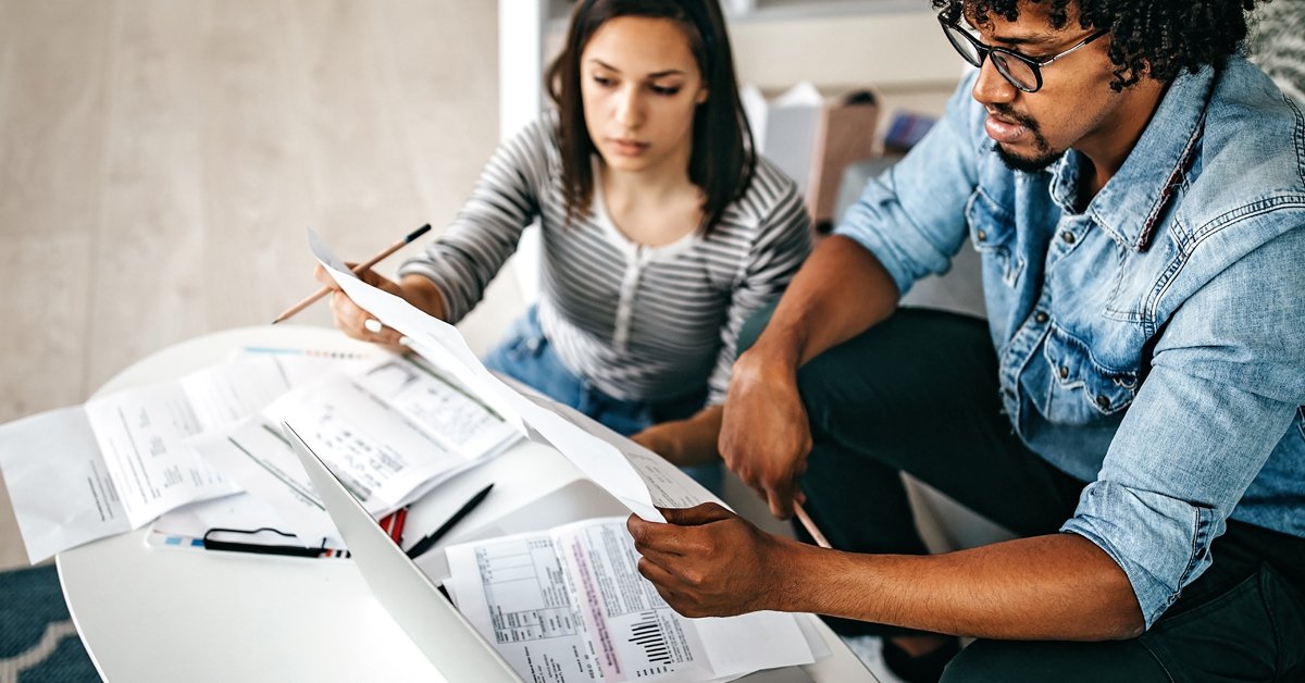 Man and woman with papers