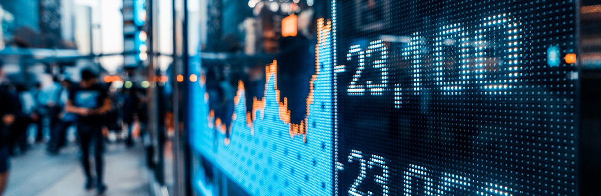 An indistinct stock market graph, highlighting the ups and downs of market trends in a visually abstract manner.