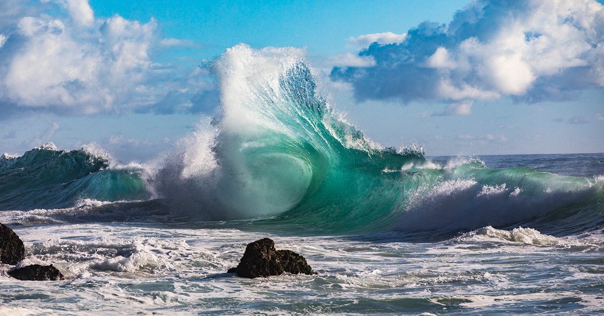 waves crashing over the rocks on a Canadian beach