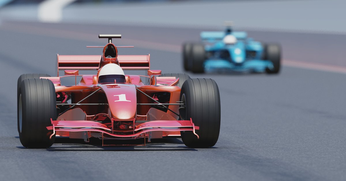 Deux voitures de course s'affrontent sur un circuit de vitesse