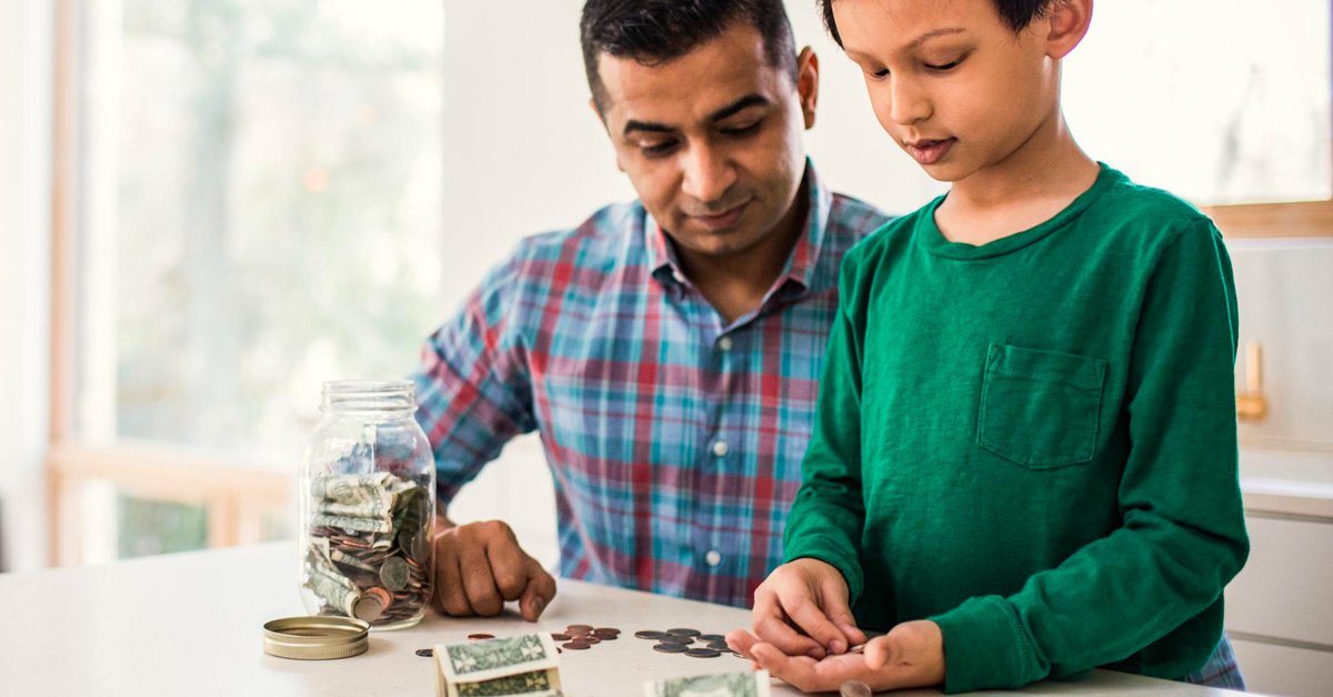 A professional businessman and woman, as adult individuals, engaged in an educational discussion indoors.