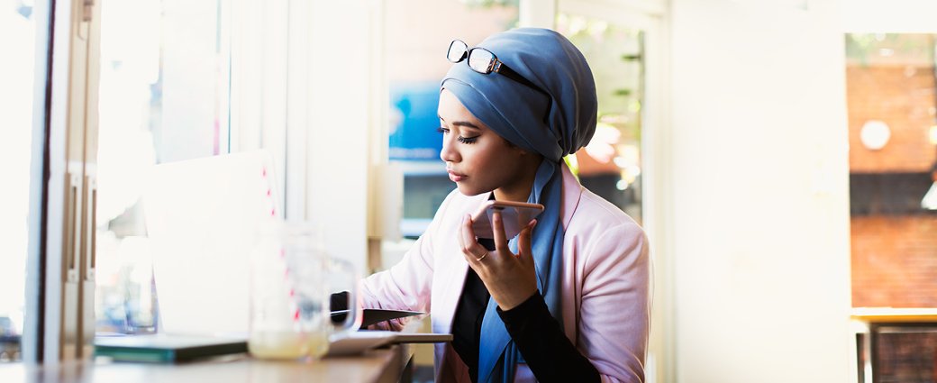 An adult female confidently portrays her business acumen in a professional portrait, exemplifying empowerment.