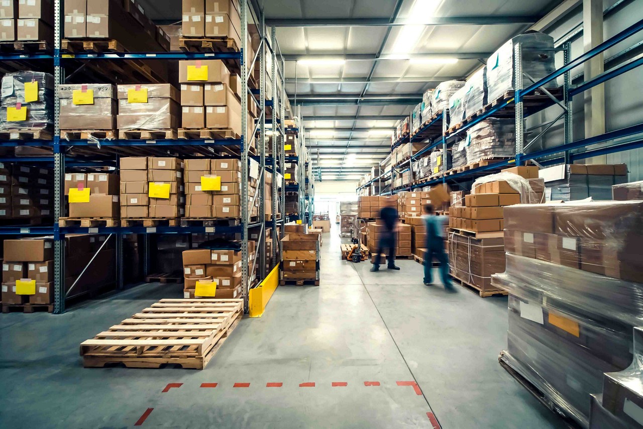 warehouse interior with shelves, pallets and boxes