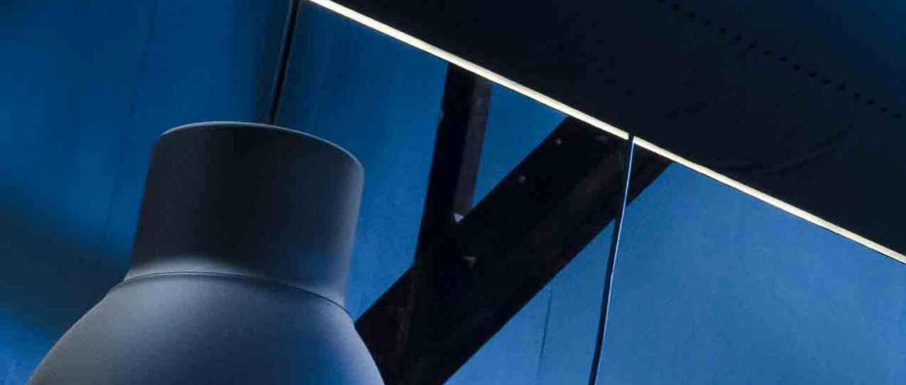 Industrial warehouse interior of roof ceiling structure skylights with ventilation air ducts and pendant lamps