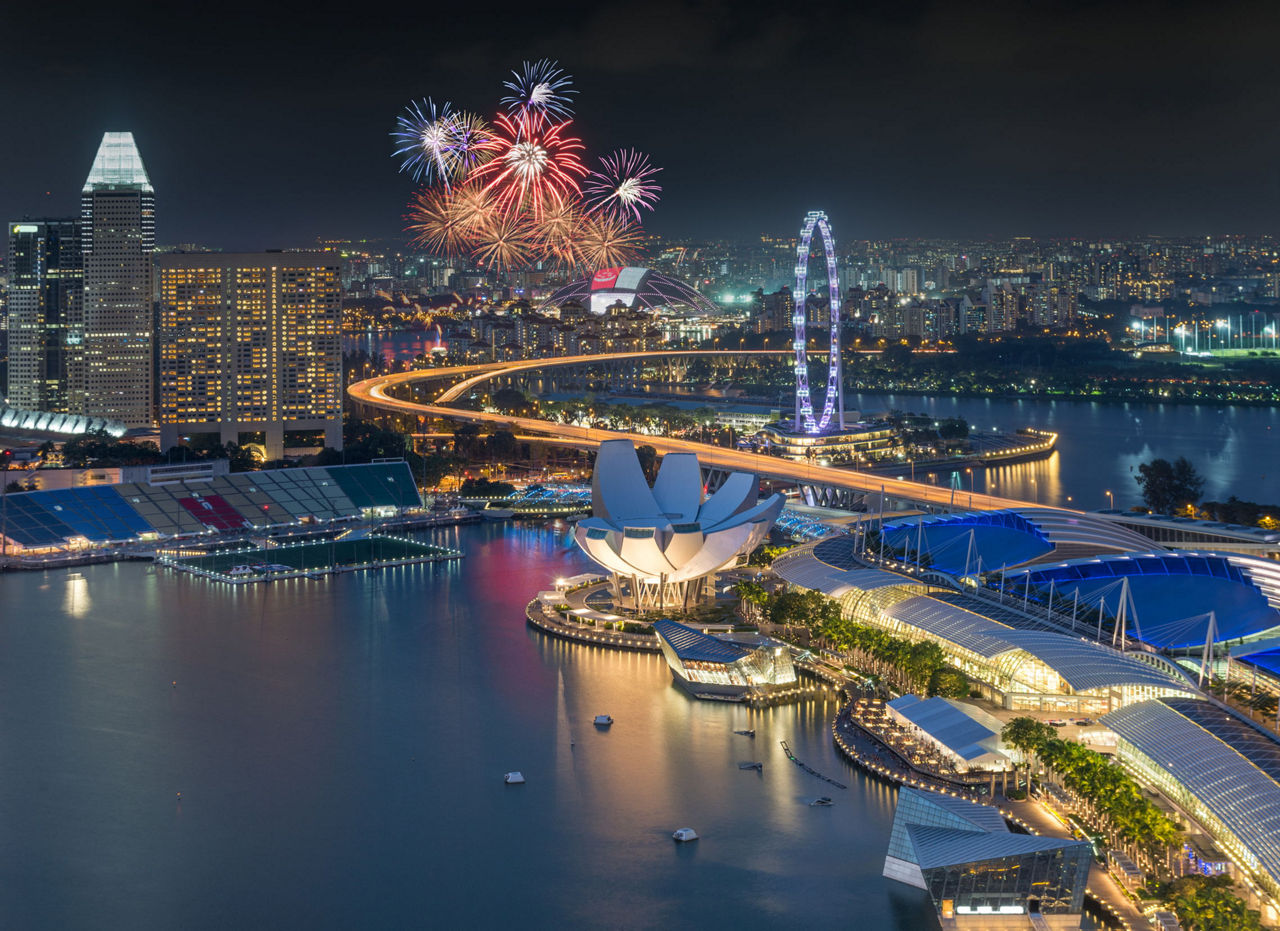 Singapore city skyline aeria viewl with firework during twilight time in Singapore National day