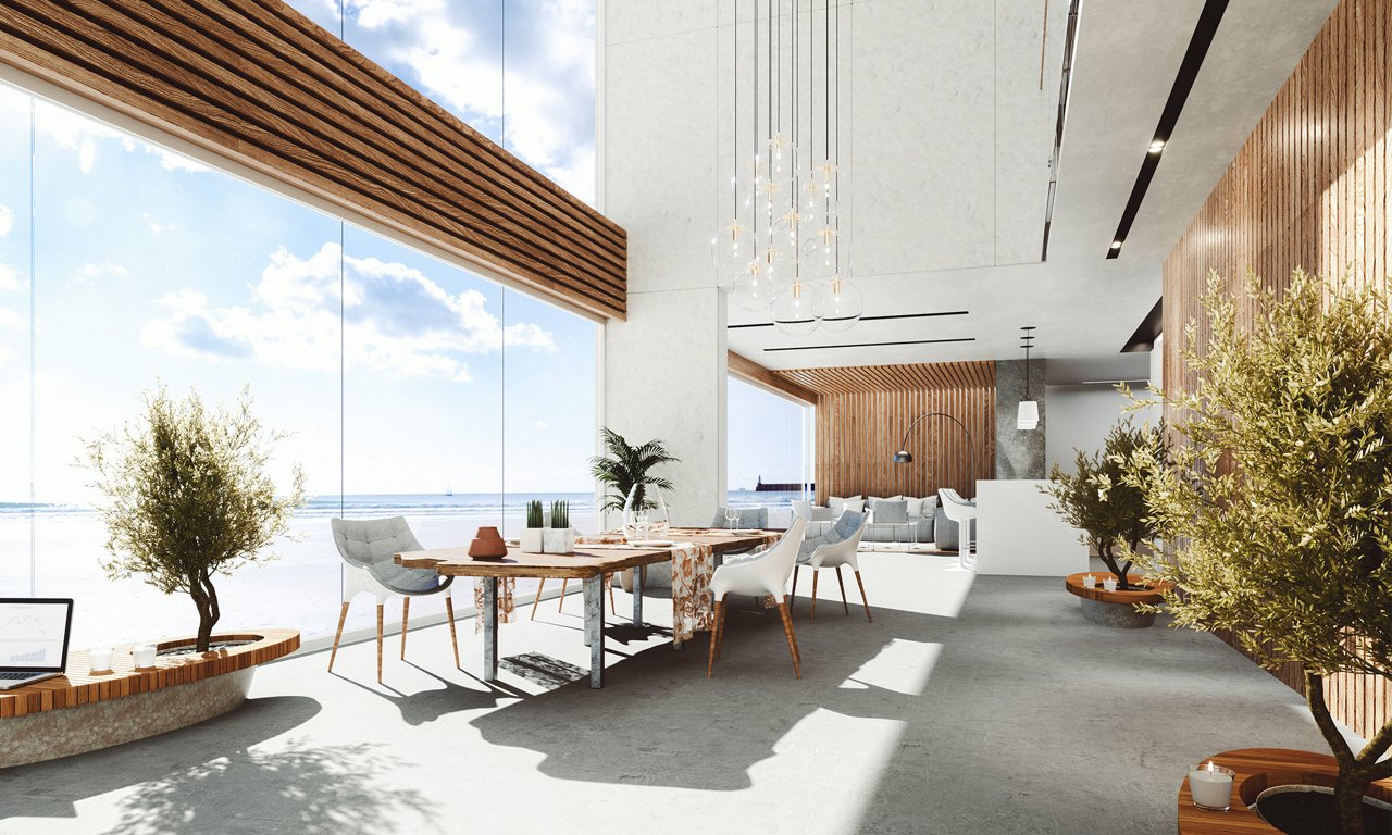 Spacious contemporary office lounge featuring a long wooden table and stylish chairs is bathed in natural light. Floor-to-ceiling windows reveal a bright sky and expansive outdoor view, creating an open, airy atmosphere. Minimalist wood paneling, pendant lights, and indoor trees add warmth and organic texture to the sleek interior. The setting suggests a collaborative workspace or informal meeting area designed for comfort and creativity.