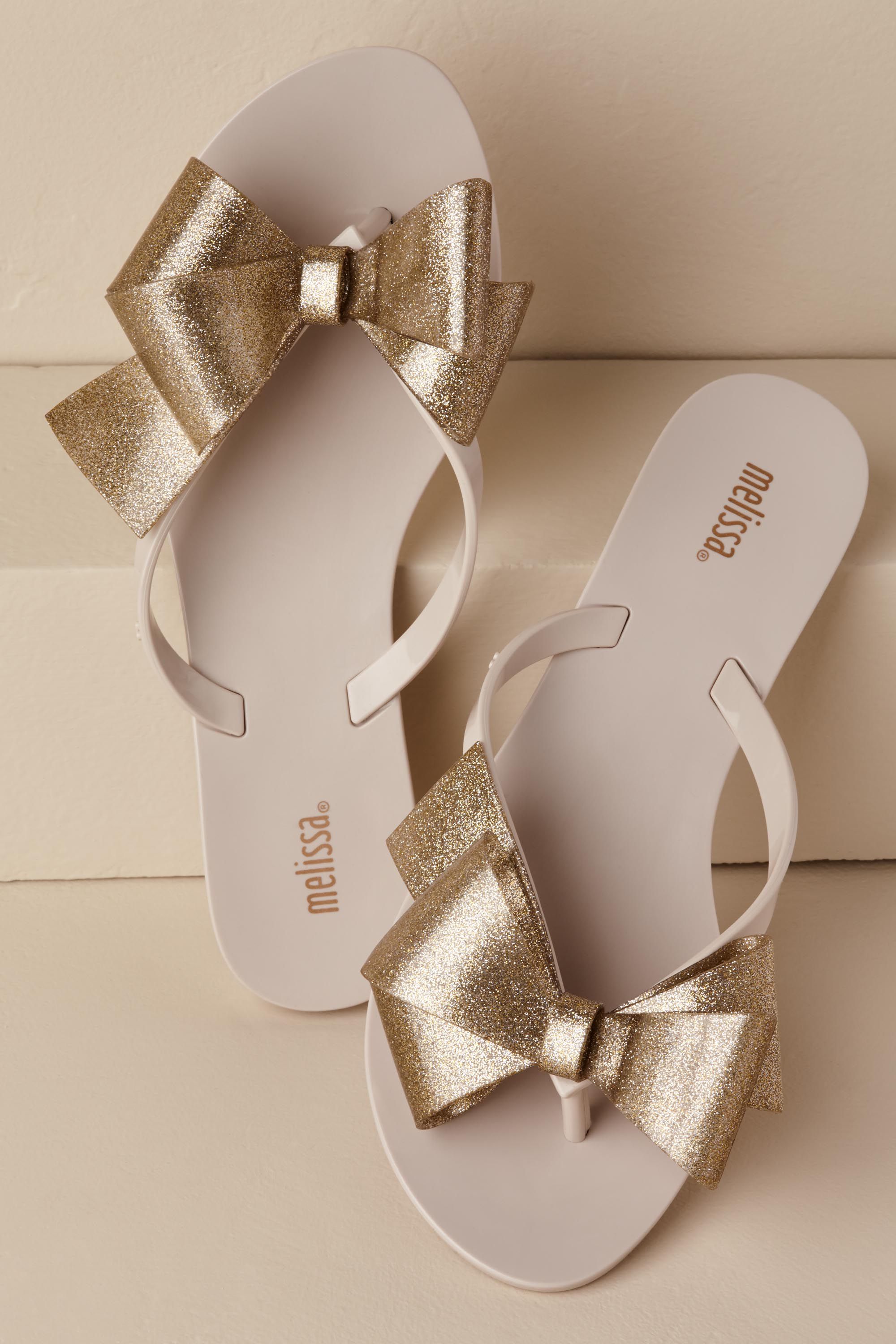 silver bow flip flops