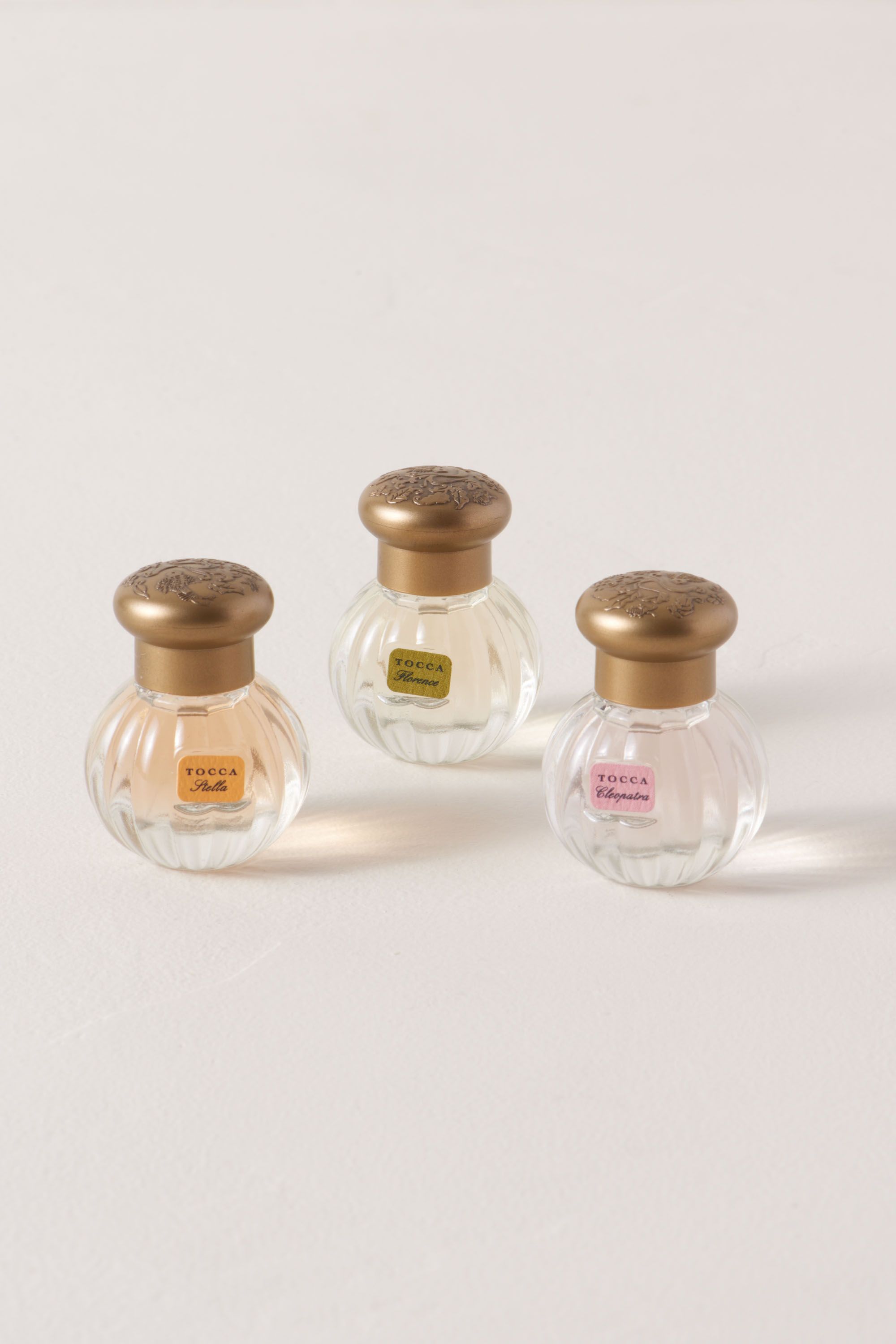 Assorted Tocca Mini Perfume Set | BHLDN. Pink & Gold Bridal Shower Decor, DIY + Gift Ideas...certainly lovely indeed. Decorating ideas for bridal showers and gift guide as well as DIY ideas for romantic paper flowers!