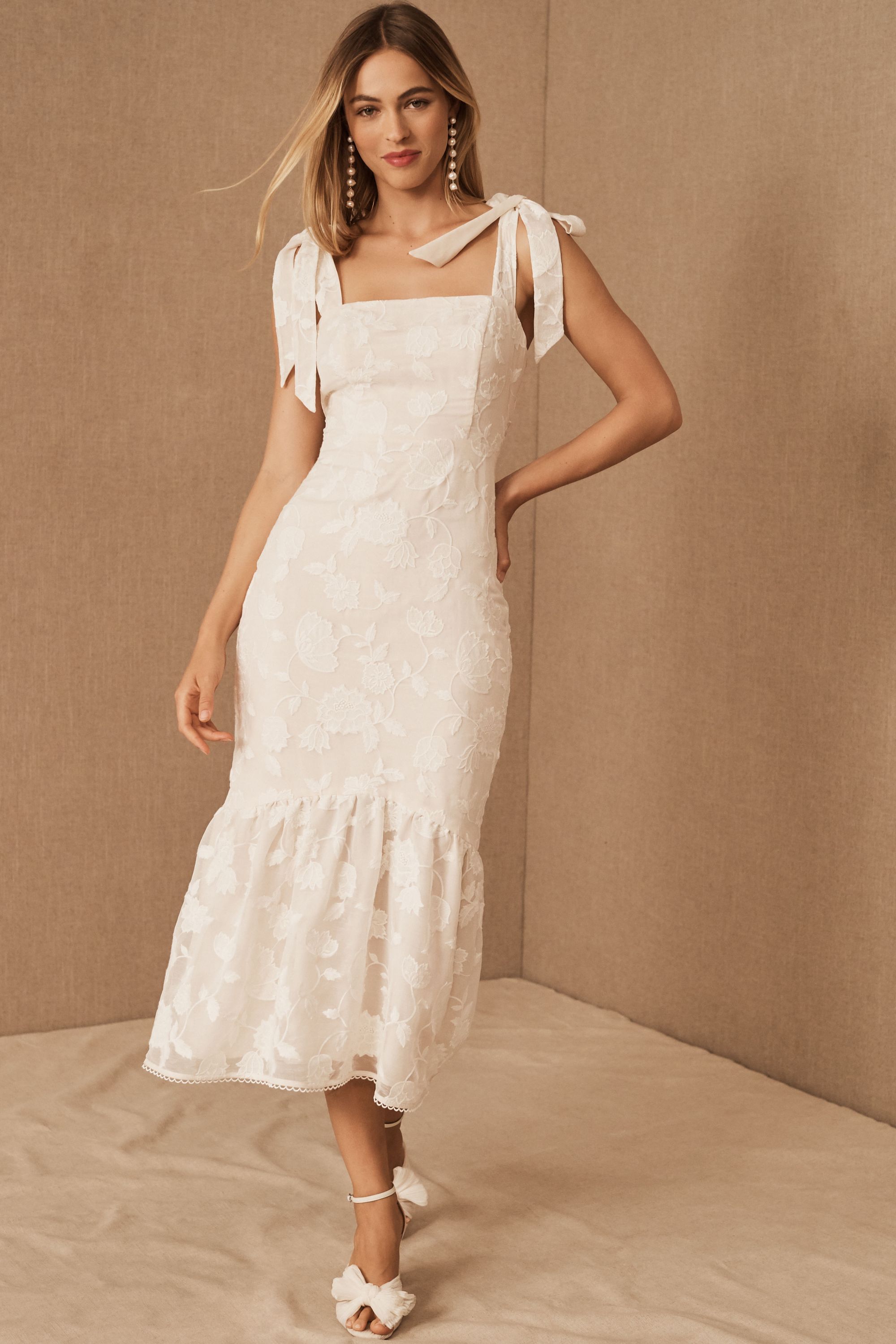 white dress for wedding rehearsal dinner