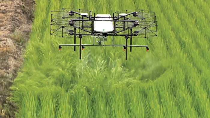 Farmers on sale using drones