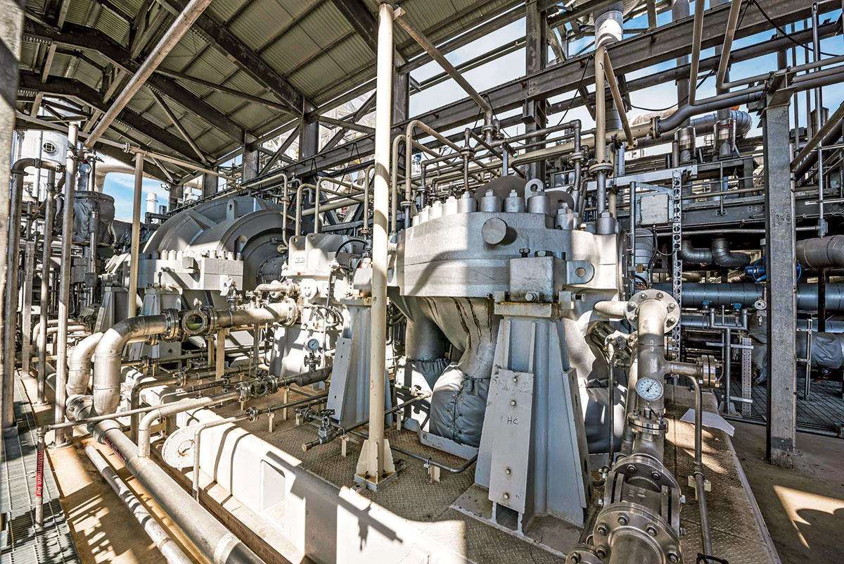 An image of the machinery outside at an ammonia plant.