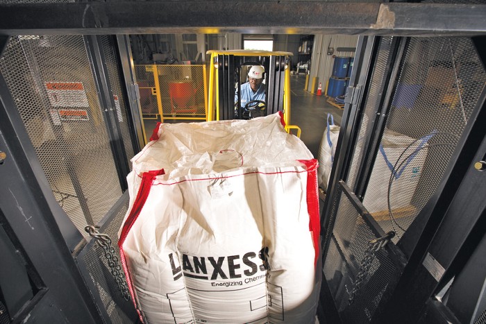 A worker at a polymer plant.