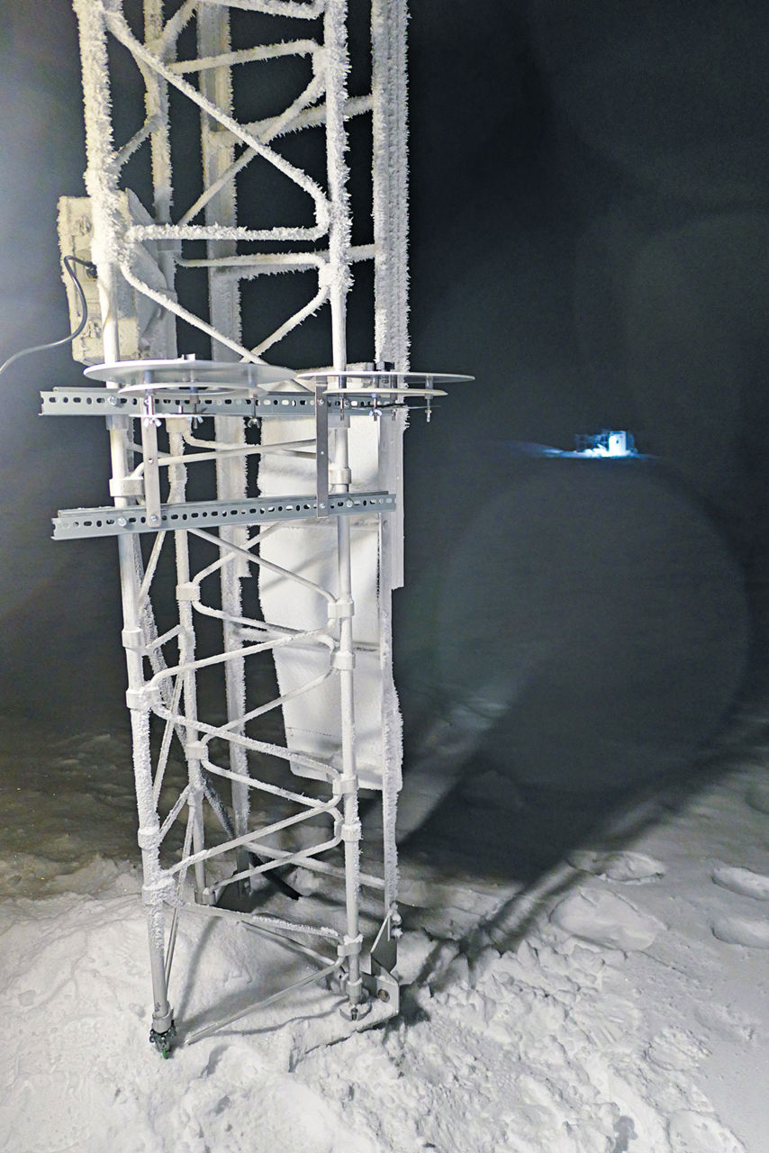 Equipment on the snow in the dark.