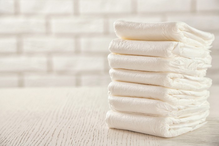 A stack of disposable diapers.
