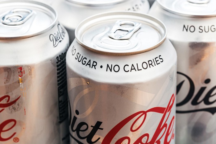 Cans of diet soda with the labels "no sugar and no calories."