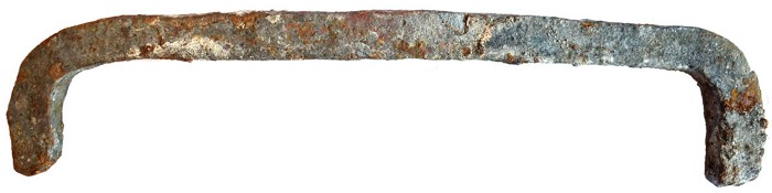 Image of an old staple that is helping to hold together the walls of Notre Dame Cathedral.