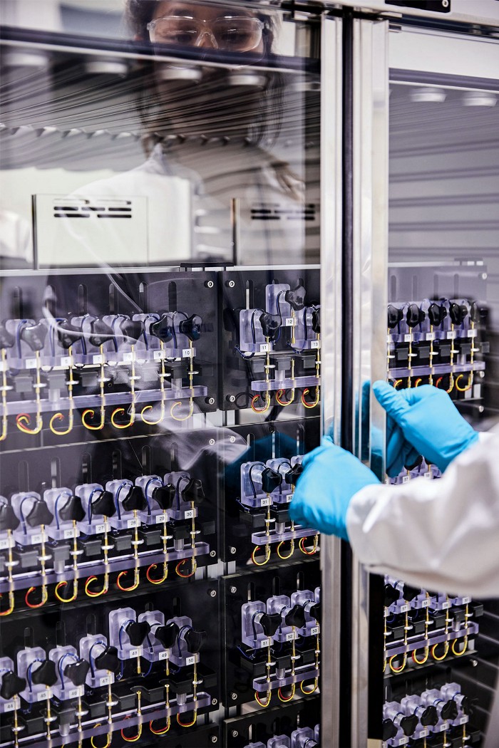 A cabinet with an array of coin cell batteries that Umicore is testing.