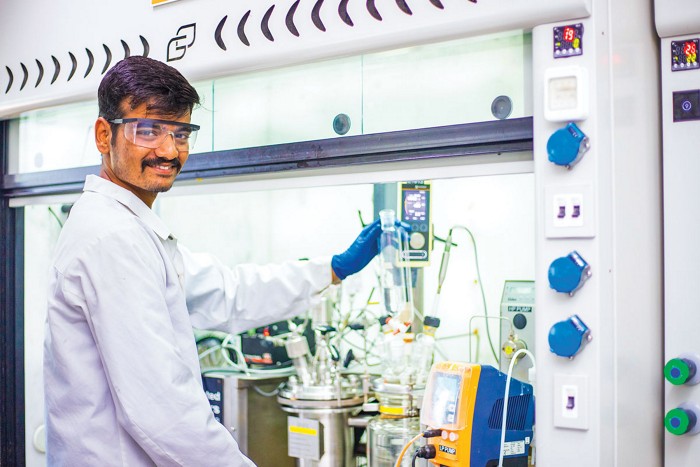 A scientist at Navin Molecular's manufacturing plant in India.