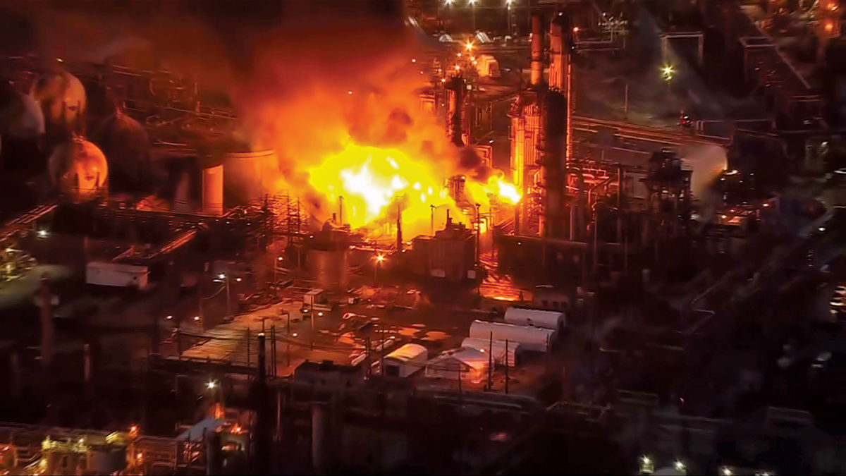 Nighttime photo of a fire at an industrial facility.