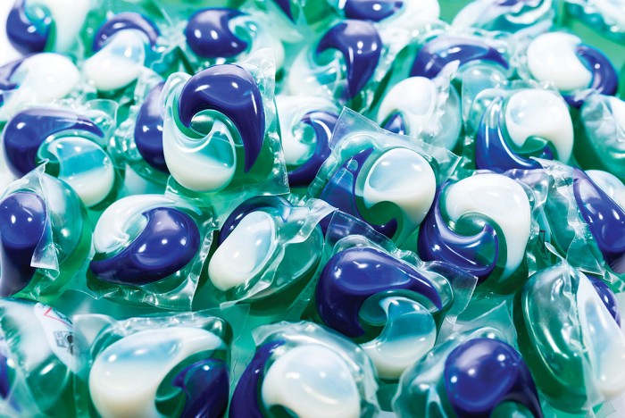 What makes dissolving detergent pods hold together, and are they