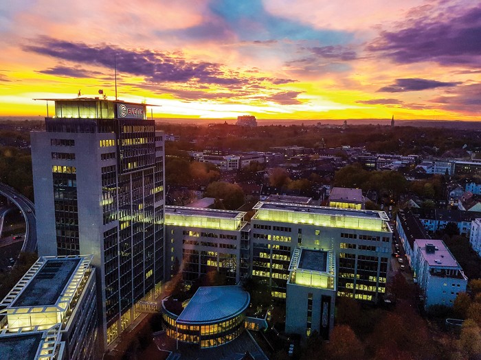 Evonik Industries' headquarters in Essen, Germany, at sunset.