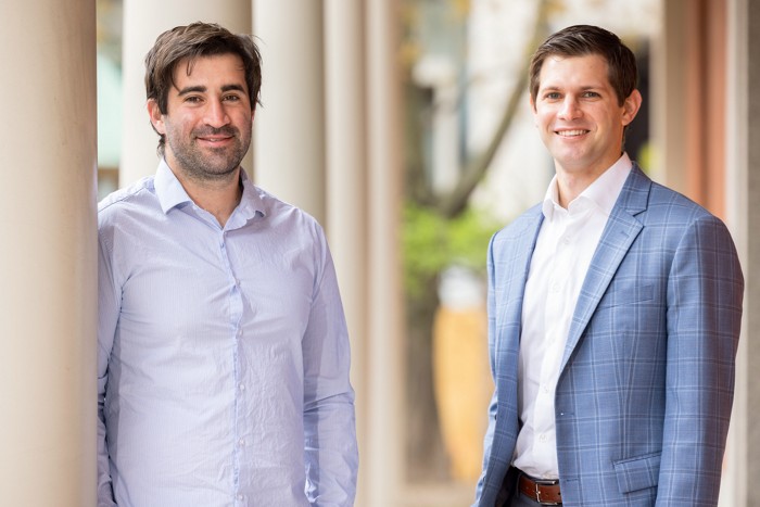 Josh Cohen and Justin Klee stand side by side, smiling.