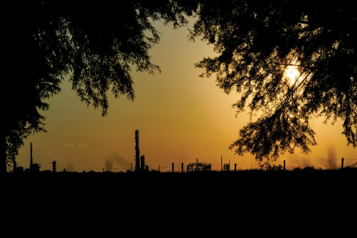 A chemical plant at sunset.