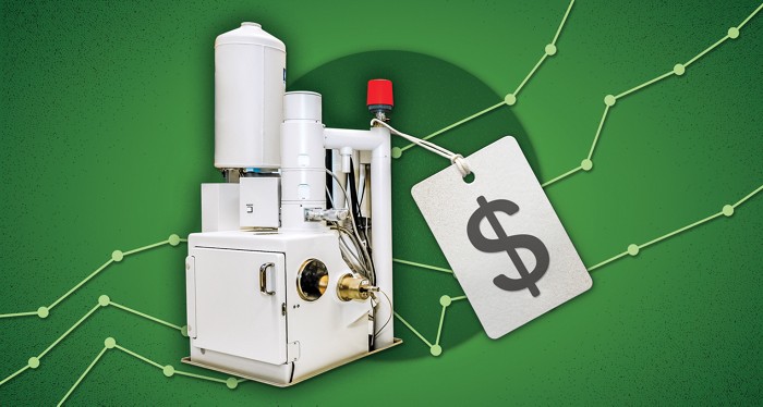 Photo collage shows a scanning electron microscope with an old-fashioned price tag. In the background, lines go up.