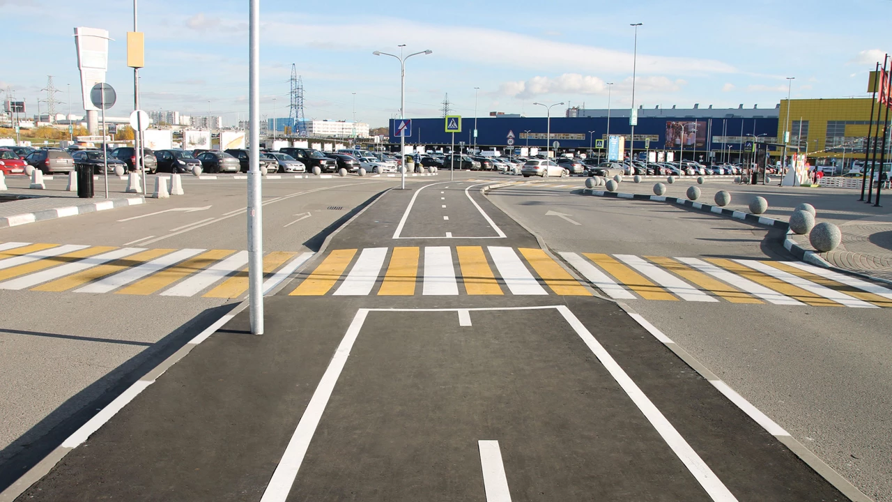 Traffic markings in front of what appears to be an Ikea store.