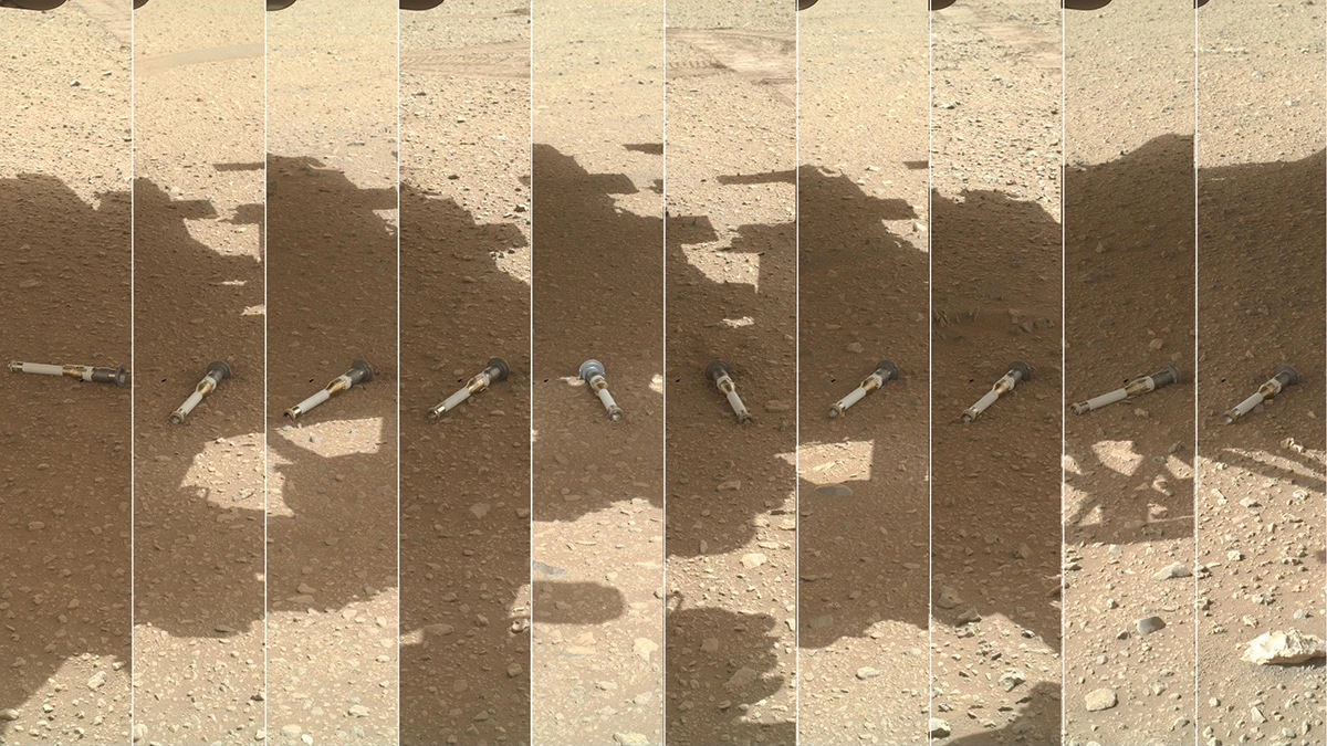 A series of images shows small white tubes with gold hardware lying on a dull brown dusty surface. In each image, the shadow of the <i>Perseverance</i> rover falls across the sample.