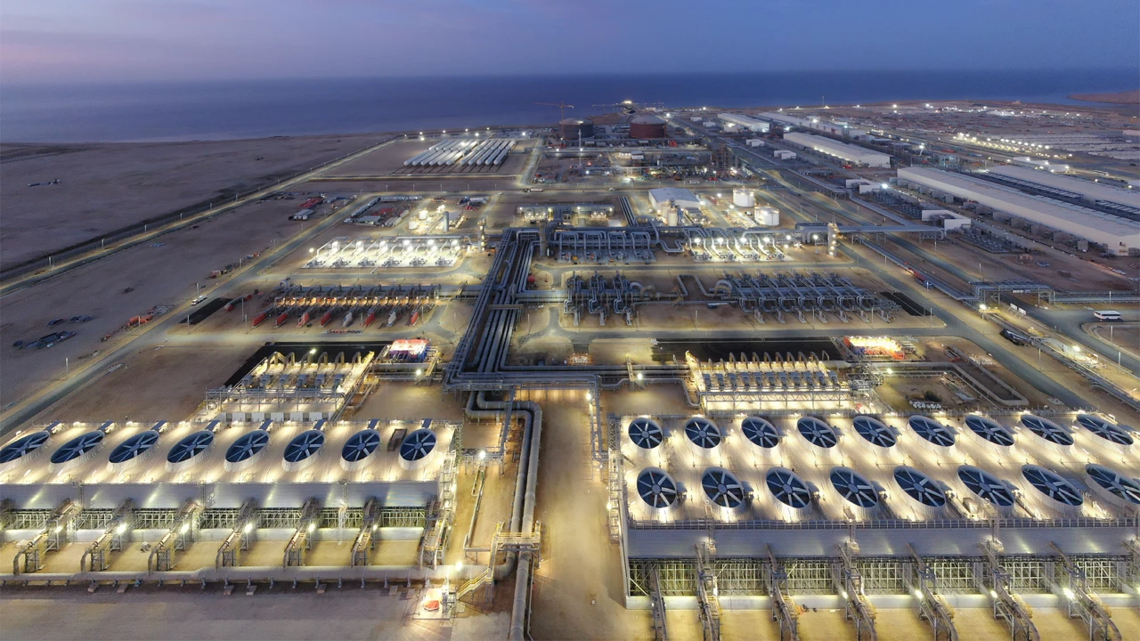 An aerial view of an industrial complex with lots of fans.