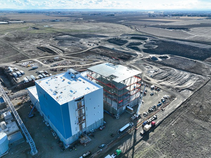 Two tall buildings are shown as part of a silicon anode facility in Washington.