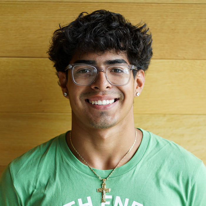 Student smiling at camera