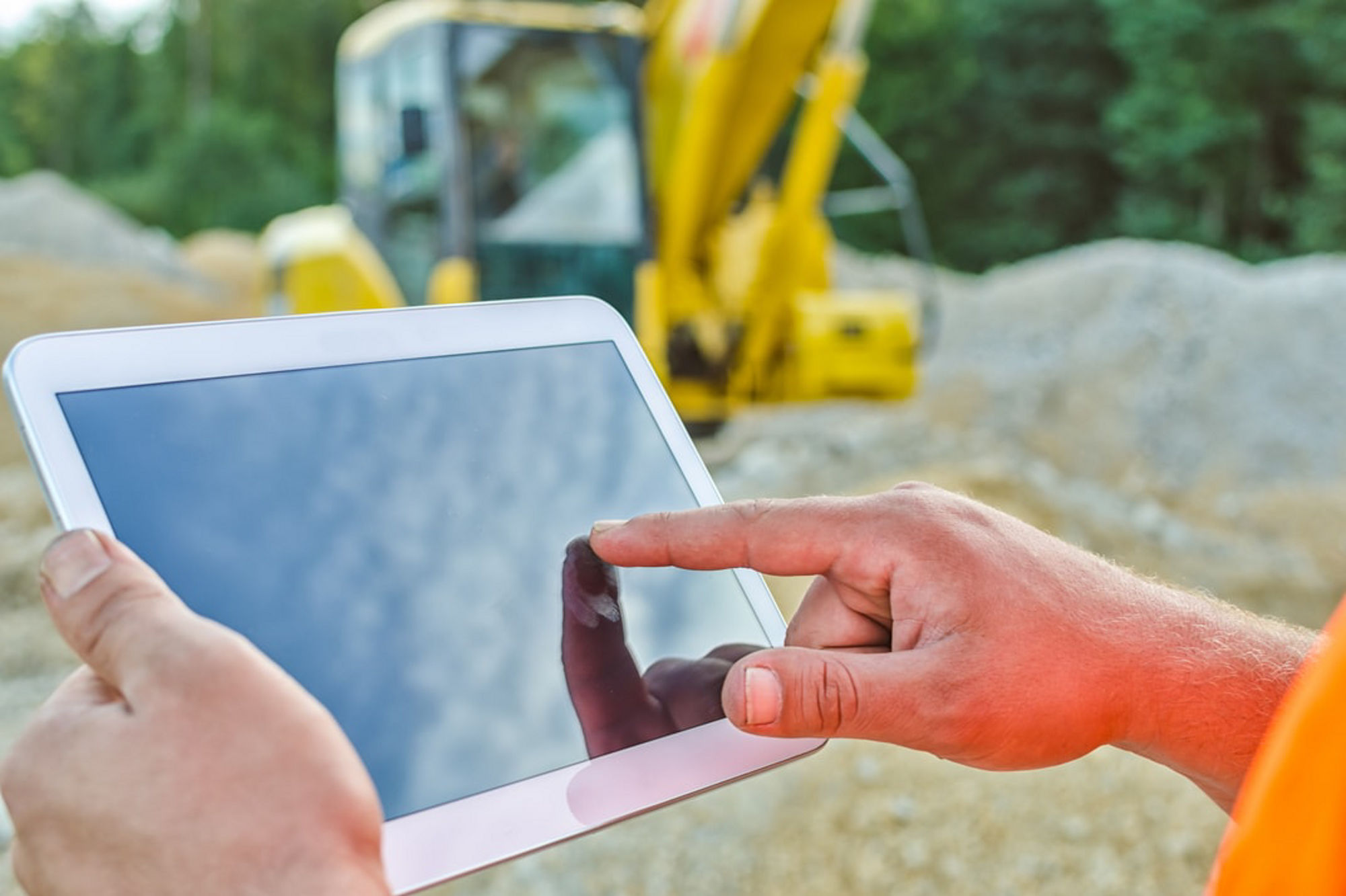 Construction Worker Contractor Using Tablet Computer