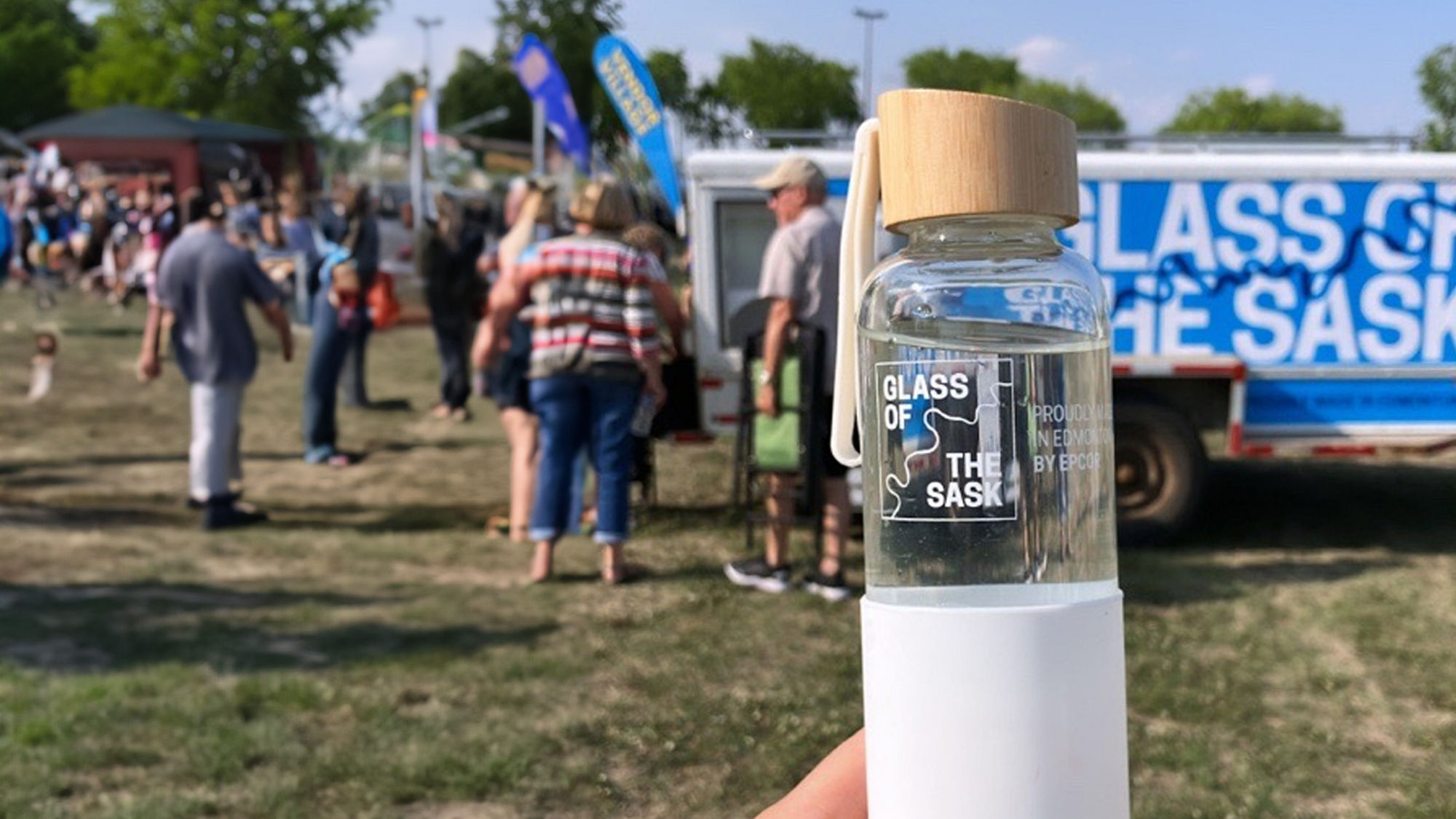 Glass of the Sask bottle at local festival