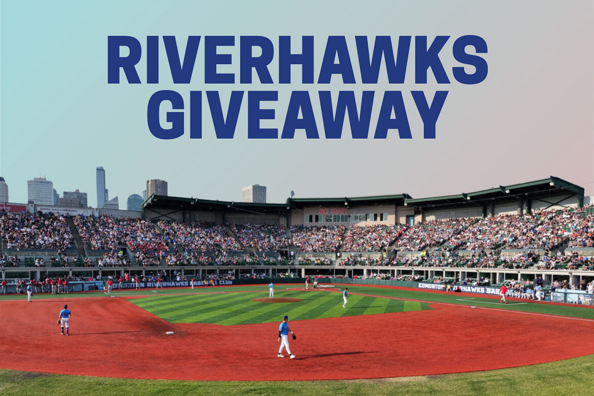 Crowd-filled Edmonton Riverhawks baseball game at RE/MAX Field during an Encor giveaway event, showcasing a vibrant in-stadium experience.