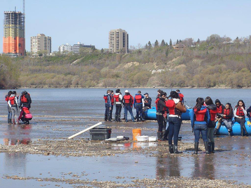 RiverWatch student participants conducting water chemistry tests