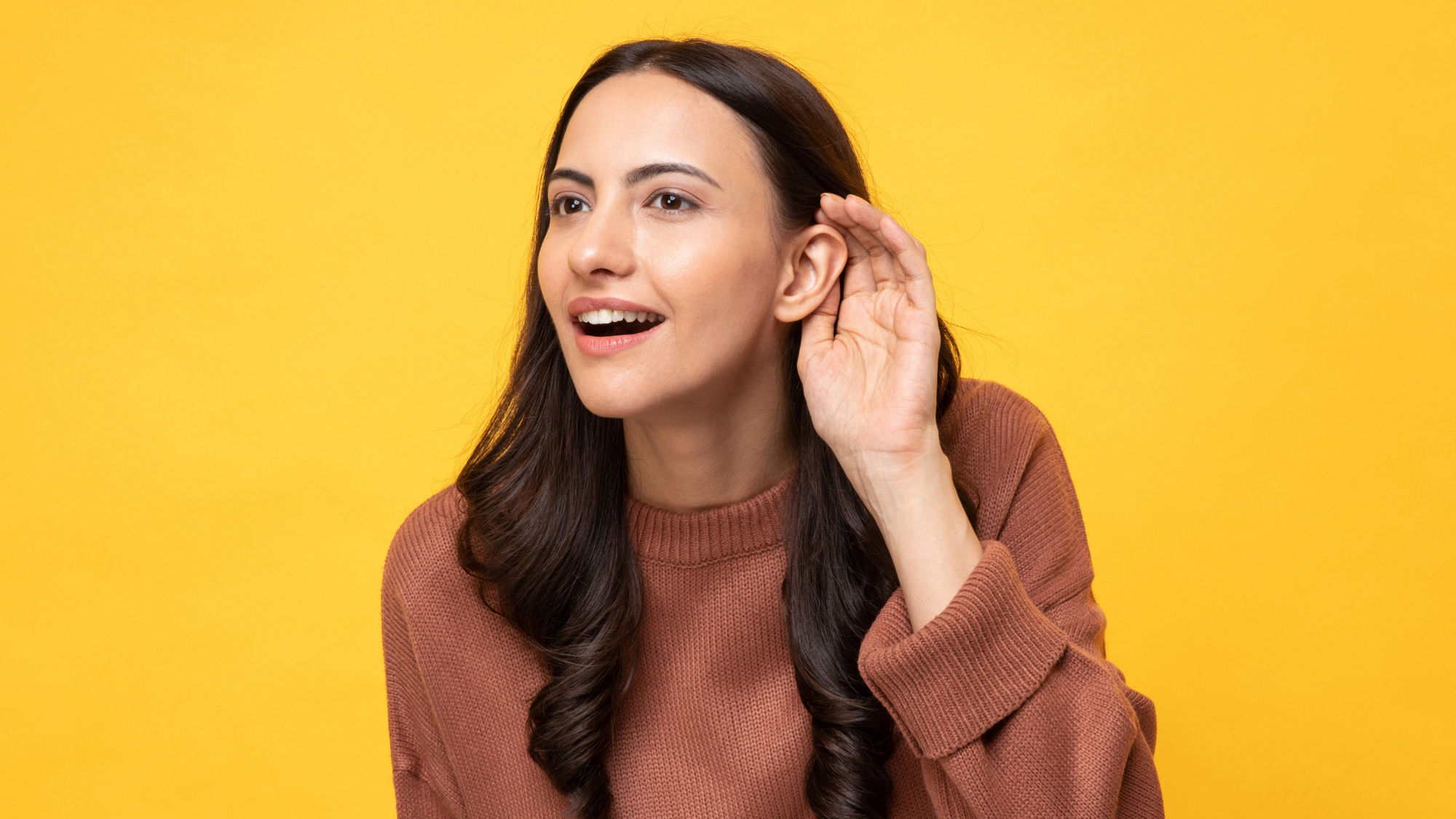 Encor Images  - woman listening 