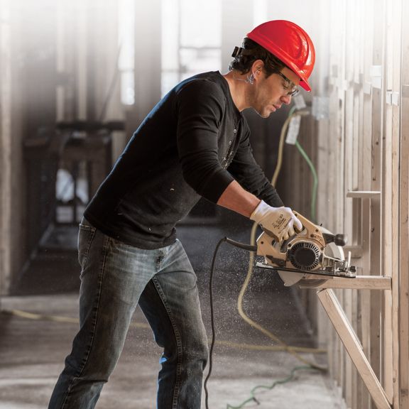 North_Zone_Hard_Hat_Worker_with_Saw