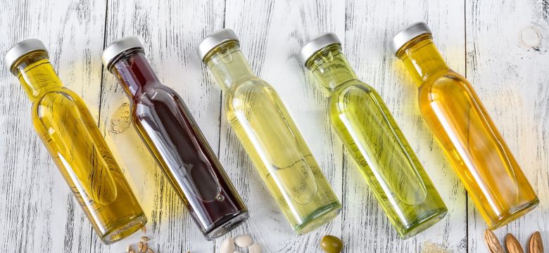 Assortment of vegetable oils in bottles; Shutterstock ID 1643191165; purchase_order: KFT; job: Asian; client: Marketing