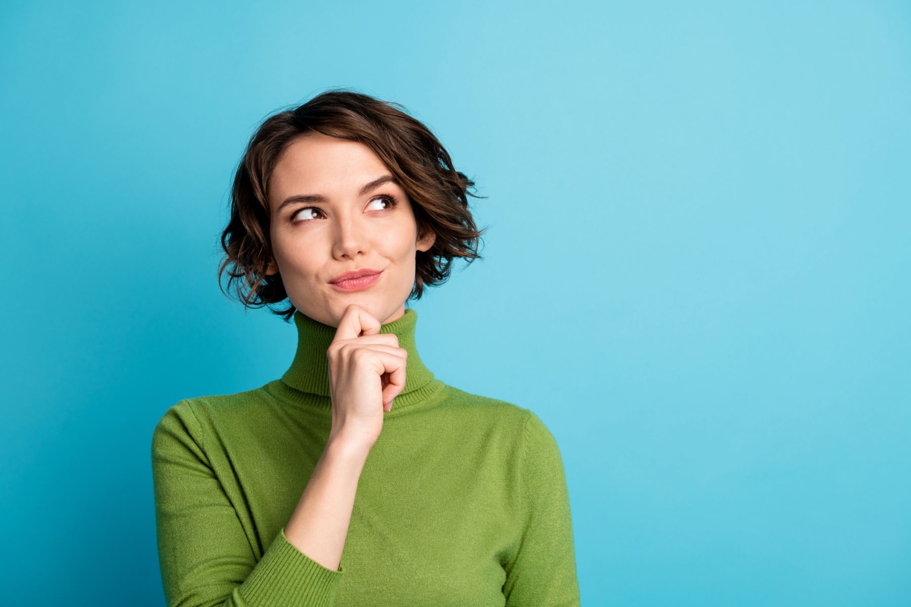 Portrait of minded woman touch hand chin look copyspace think thoughts plan autumn holiday wear jumper isolated over blue color background