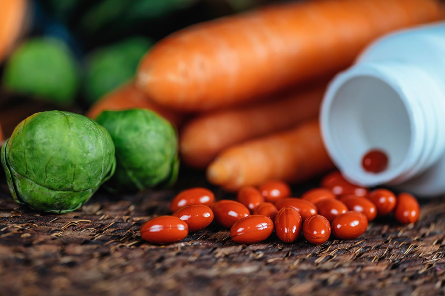 Lutein supplements and vegetables. Lutein is yellow pigment with high quantities of it naturally occurring in green leafy vegetables and some other plants. ; Shutterstock ID 1370026259; purchase_order: -; job: -; client: -