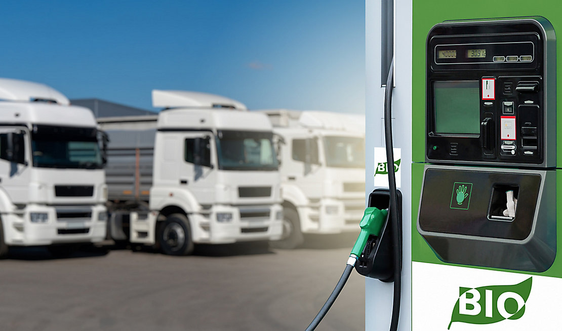 Biofuel filling station on a background of trucks; Shutterstock ID 1935961213; purchase_order: -; job: -; client: -