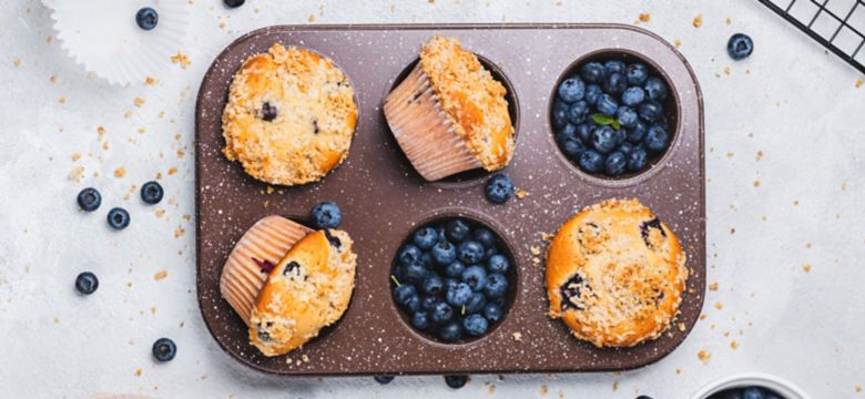 Blueberry muffins in a baking pan