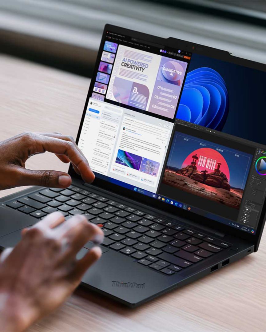Hands typing on a laptop’s keyboard.